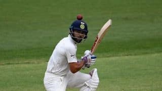 Virat Kohli and Cheteshwara Pujara dig in after India lose early wickets